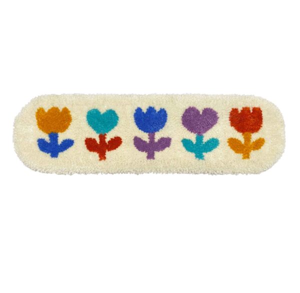 tufted panel featuring five folk art style flowers