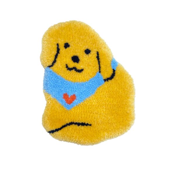 tufted dog in yellow wearing a blue kerchief with a pink heart on it