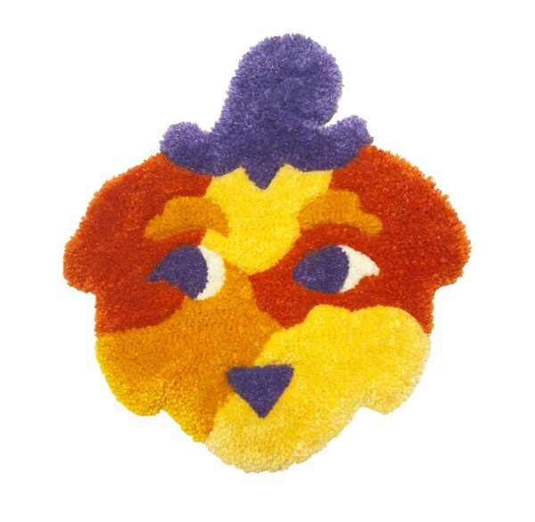 tufted forest creature mask in yellow, orange, red, and purple